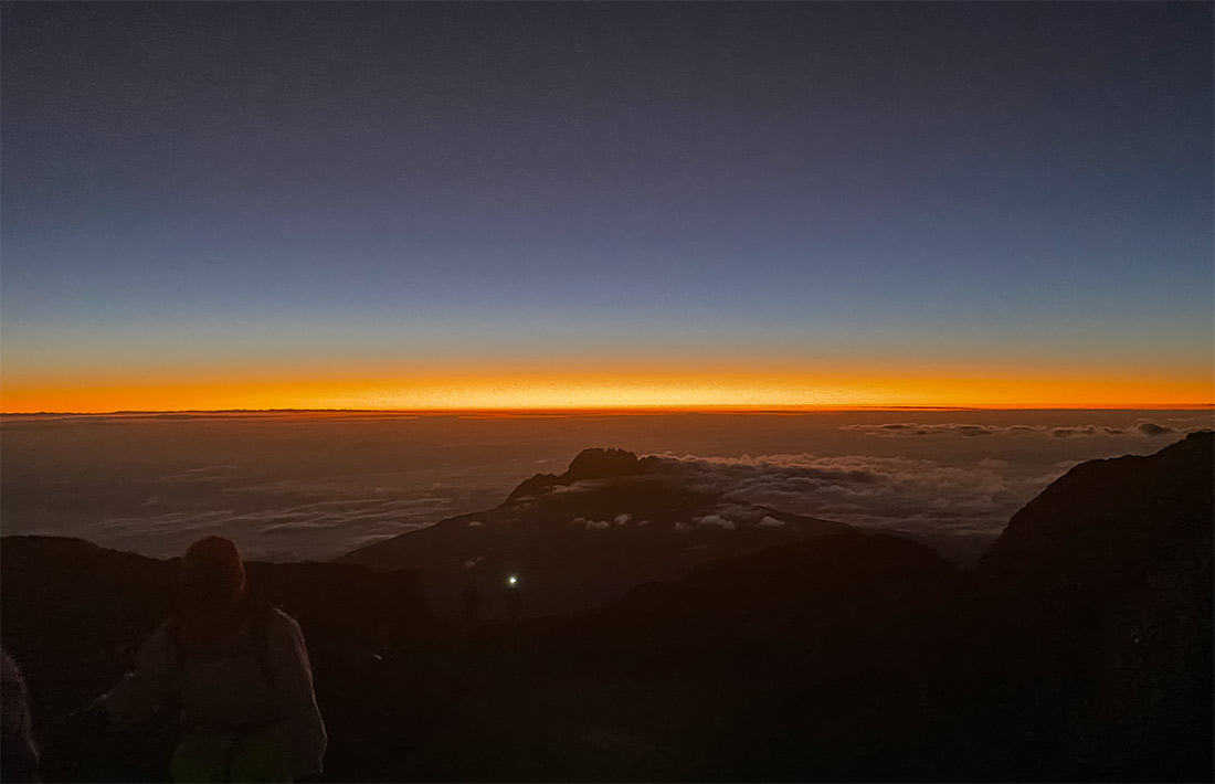 Why do you summit Kilimanjaro at night?
